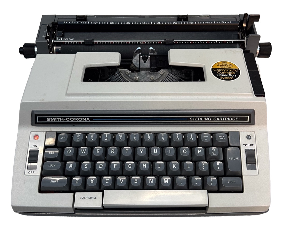 A Smith-Corona Sterling Cartridge electric typewriter, seen from the front